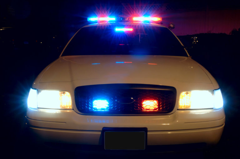 "Police Car Lights" by davidsonscott15 is licensed under CC BY 2.0.